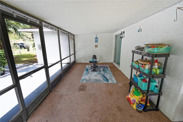 543 Silver Crse, Ocala, FL 34472 - sunroom with a textured wall and carpet floors