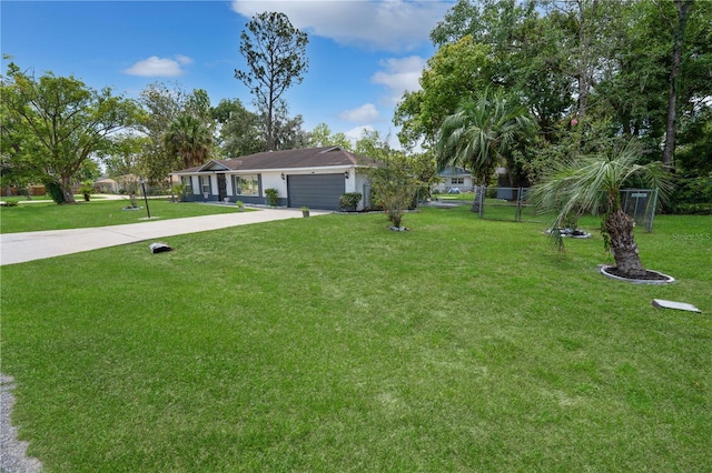 543 Silver Crse, Ocala, FL 34472 - view of yard with concrete driveway and an attached garage