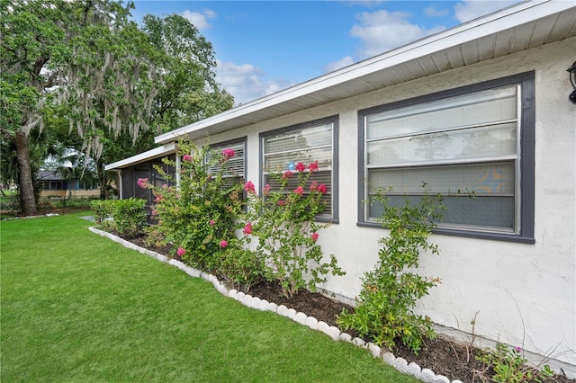 543 Silver Crse, Ocala, FL 34472 - view of side of home with stucco siding and a yard