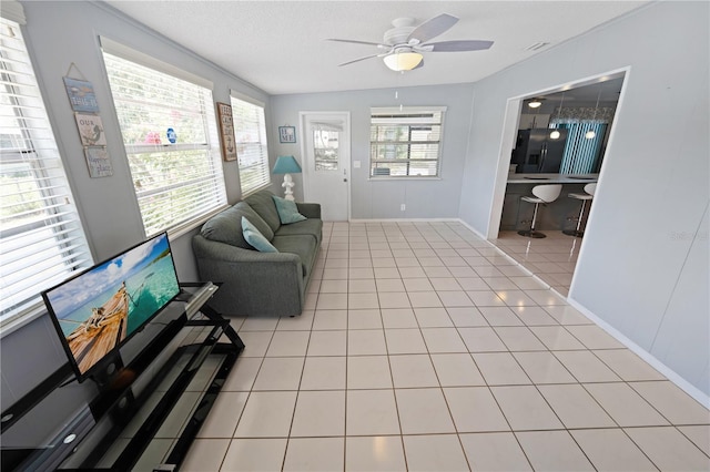 543 Silver Crse, Ocala, FL 34472 - living room featuring ceiling fan and light tile patterned floors