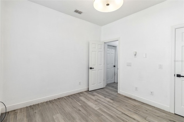 530 Harriswood Ct, Davenport, FL 33837 - empty room with light wood-style floors and baseboards