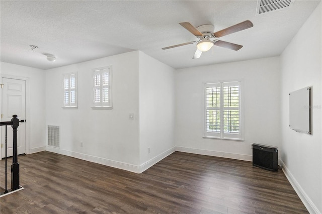 530 Harriswood Ct, Davenport, FL 33837 - unfurnished room with dark wood-type flooring, a ceiling fan, and a textured ceiling