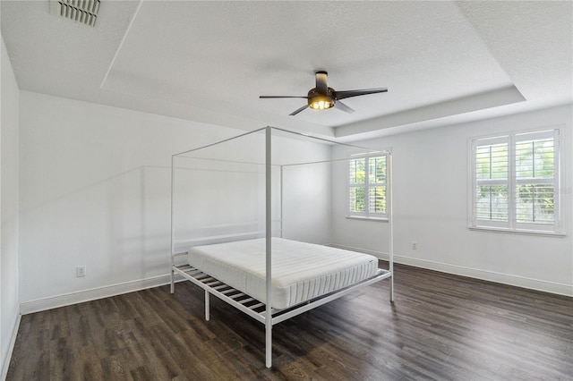 530 Harriswood Ct, Davenport, FL 33837 - bedroom featuring wood finished floors, ceiling fan, and a textured ceiling