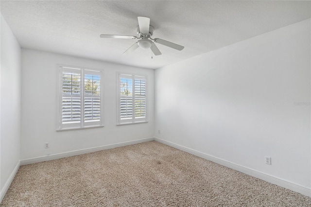 530 Harriswood Ct, Davenport, FL 33837 - carpeted empty room with a ceiling fan and a textured ceiling