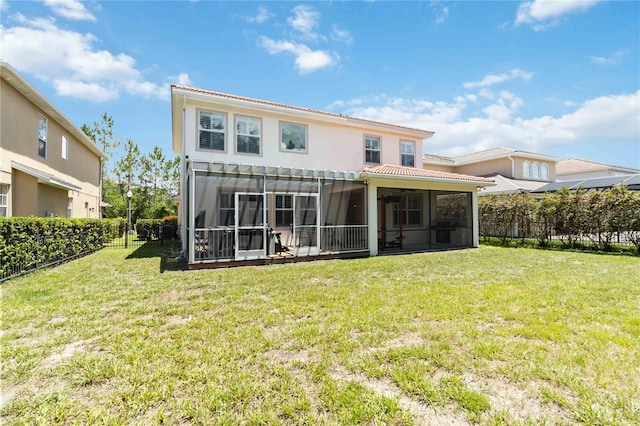 530 Harriswood Ct, Davenport, FL 33837 - back of property featuring a sunroom, a fenced backyard, and a tile roof