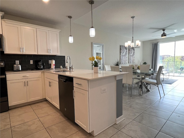 4751 Clock Tower Dr Unit 304, Kissimmee, FL 34746 - kitchen with dishwasher, a peninsula, decorative backsplash, ceiling fan, and light tile patterned flooring