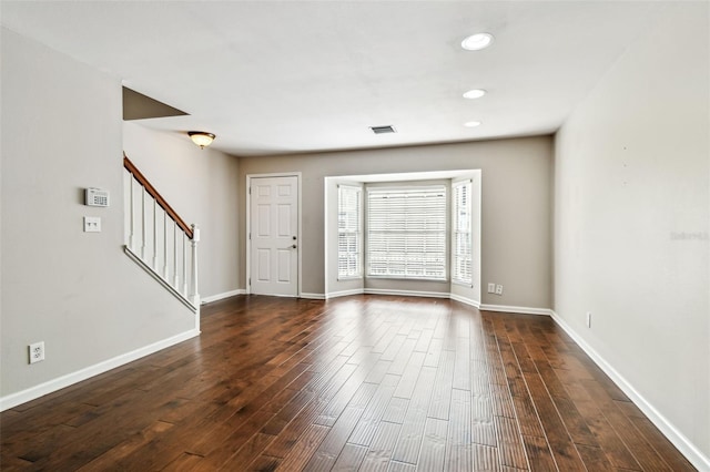 609 S Glen Ave Unit E, Tampa, FL 33609 - entryway featuring dark wood-style floors, stairway, and recessed lighting