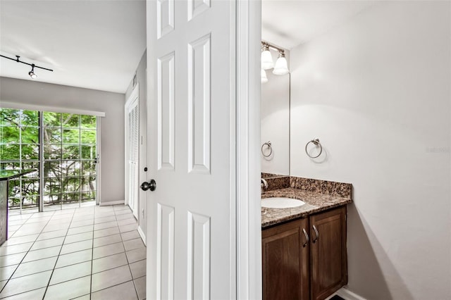 609 S Glen Ave Unit E, Tampa, FL 33609 - bathroom featuring vanity and tile patterned floors