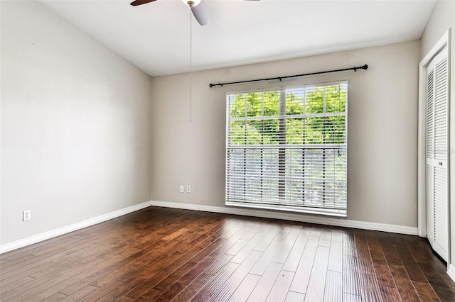 609 S Glen Ave Unit E, Tampa, FL 33609 - spare room with ceiling fan and dark wood-type flooring
