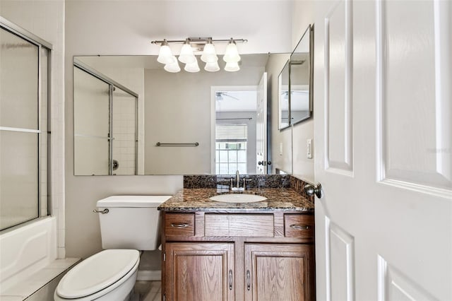 609 S Glen Ave Unit E, Tampa, FL 33609 - full bathroom featuring vanity and combined bath / shower with glass door