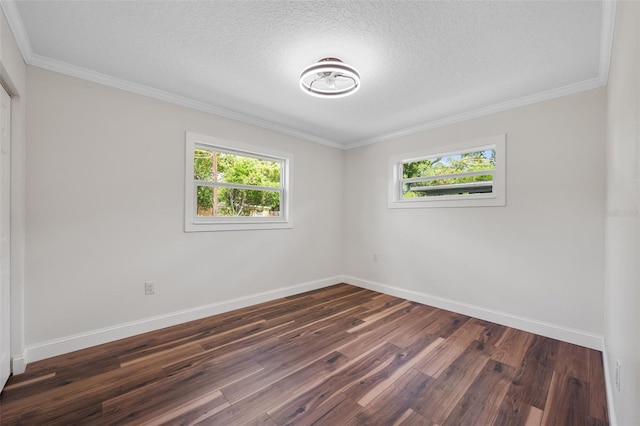 709 Suzette Dr, Ocoee, FL 34761 - unfurnished room with plenty of natural light, dark wood-type flooring, ornamental molding, and a textured ceiling