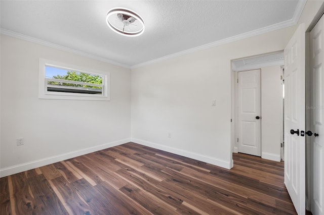 709 Suzette Dr, Ocoee, FL 34761 - unfurnished room with crown molding, dark wood finished floors, and a textured ceiling