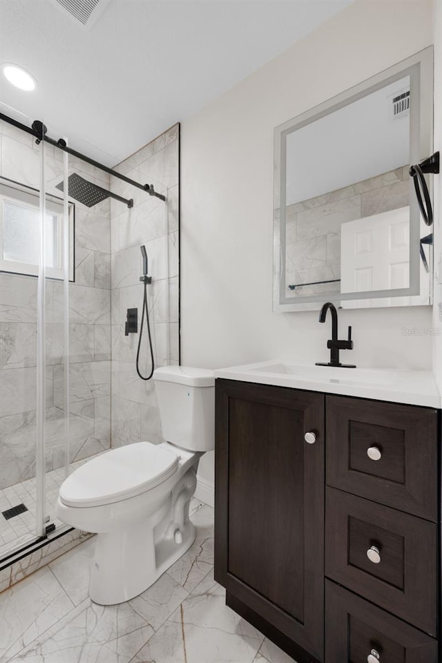 709 Suzette Dr, Ocoee, FL 34761 - full bath featuring marble look tile flooring, vanity, and a stall shower