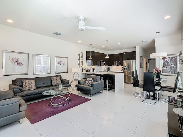 1521 Tranquil Ave, Clermont, FL 34714 - living area with ceiling fan, light tile patterned flooring, and recessed lighting