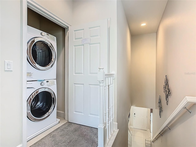 1521 Tranquil Ave, Clermont, FL 34714 - laundry room with stacked washer and clothes dryer, recessed lighting, and carpet
