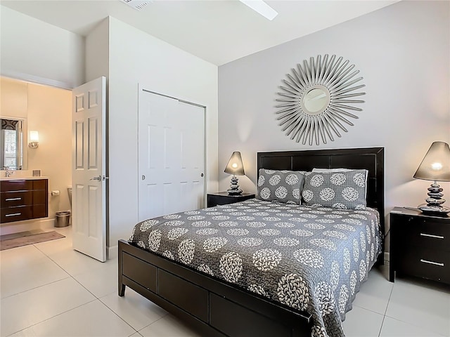 1521 Tranquil Ave, Clermont, FL 34714 - bedroom featuring light tile patterned floors and ensuite bathroom
