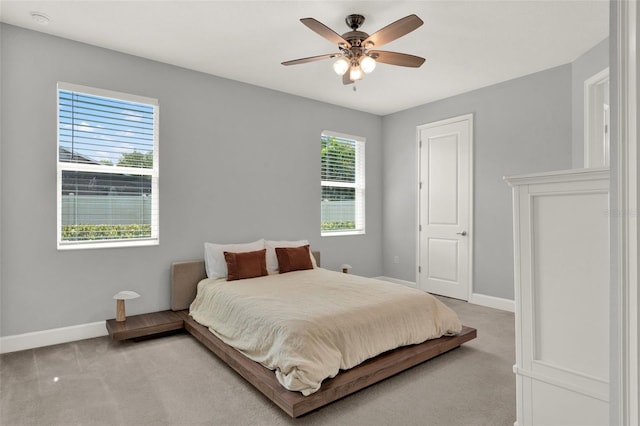 1061 Castlevecchio Loop, Orlando, FL 32825 - bedroom featuring light carpet and ceiling fan