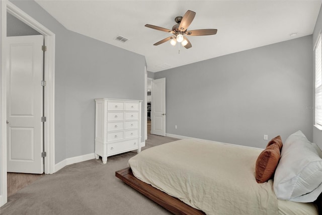 1061 Castlevecchio Loop, Orlando, FL 32825 - carpeted bedroom featuring baseboards and a ceiling fan