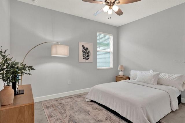 1061 Castlevecchio Loop, Orlando, FL 32825 - carpeted bedroom with baseboards and ceiling fan