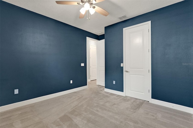 1061 Castlevecchio Loop, Orlando, FL 32825 - unfurnished bedroom featuring carpet flooring and ceiling fan