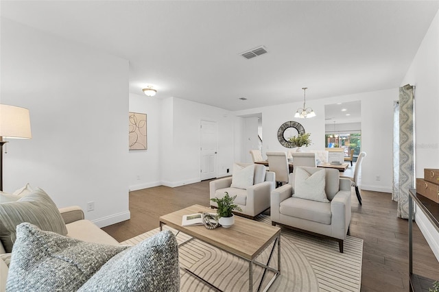 2432 Riviera Ln, Minneola, FL 34715 - living room with wood finished floors and a chandelier