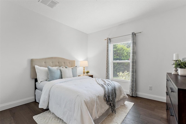 2432 Riviera Ln, Minneola, FL 34715 - bedroom with dark wood-type flooring