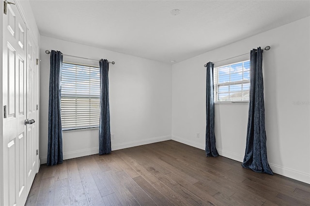 2432 Riviera Ln, Minneola, FL 34715 - unfurnished room featuring dark wood-style floors and baseboards