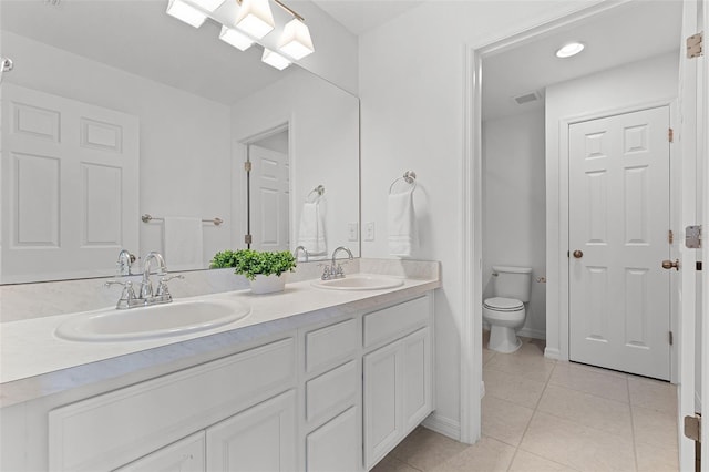 2432 Riviera Ln, Minneola, FL 34715 - bathroom with double vanity and tile patterned floors