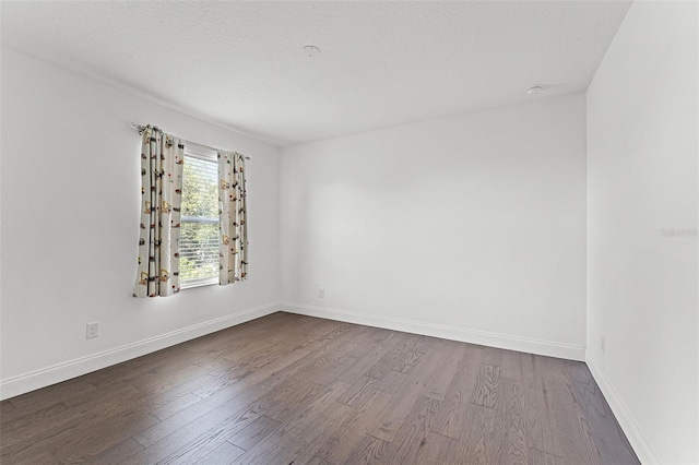 2432 Riviera Ln, Minneola, FL 34715 - spare room with dark wood-style floors