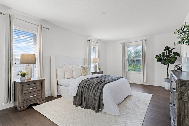 2432 Riviera Ln, Minneola, FL 34715 - bedroom with dark wood-type flooring and a textured ceiling