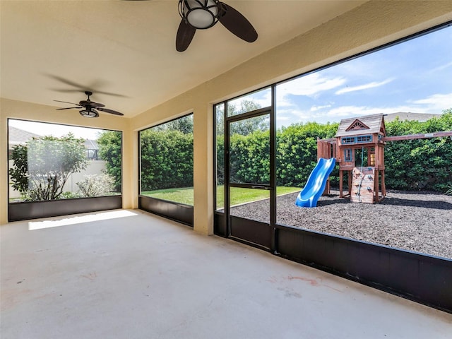 2432 Riviera Ln, Minneola, FL 34715 - unfurnished sunroom with a ceiling fan