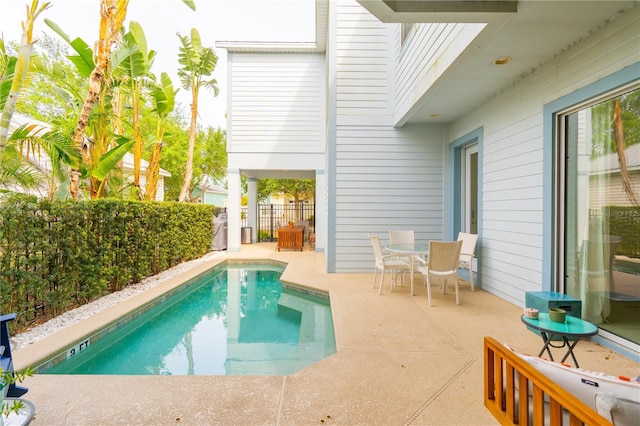 1545 Fairview Cir, Reunion, FL 34747 - view of swimming pool featuring a patio area and outdoor dining area