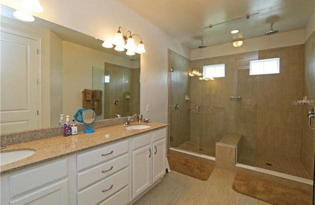 1545 Fairview Cir, Reunion, FL 34747 - full bathroom with a stall shower and double vanity