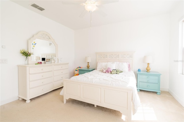 1545 Fairview Cir, Reunion, FL 34747 - bedroom with light carpet and a ceiling fan