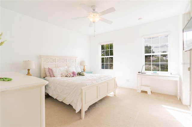 1545 Fairview Cir, Reunion, FL 34747 - bedroom featuring light colored carpet and ceiling fan