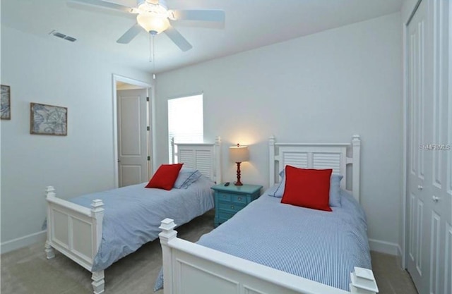 1545 Fairview Cir, Reunion, FL 34747 - bedroom with carpet floors, a closet, and a ceiling fan