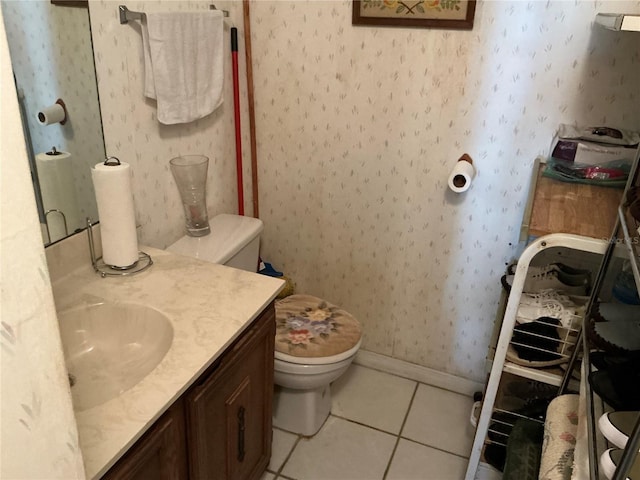 1409 Oak Pl Unit F, Apopka, FL 32712 - bathroom featuring tile patterned floors, vanity, and wallpapered walls