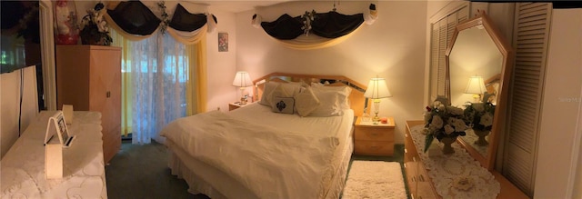 1409 Oak Pl Unit F, Apopka, FL 32712 - bedroom featuring carpet floors