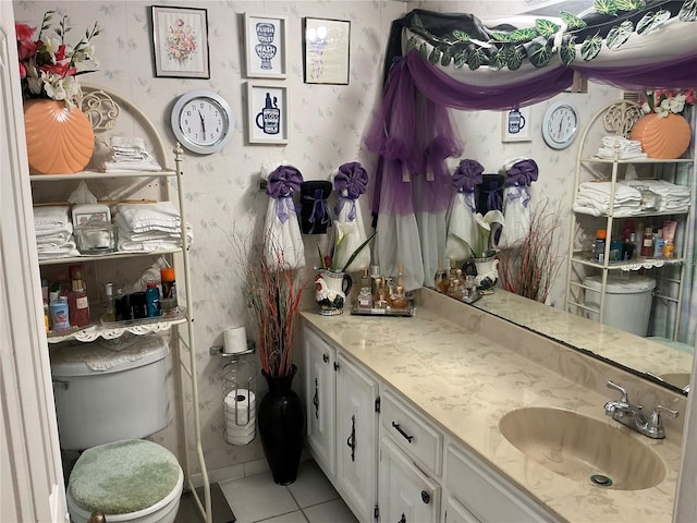 1409 Oak Pl Unit F, Apopka, FL 32712 - bathroom featuring tile patterned flooring, vanity, and wallpapered walls