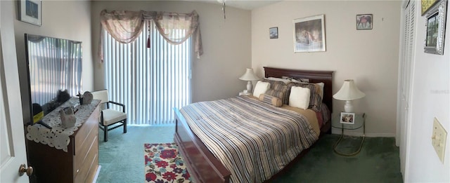 1409 Oak Pl Unit F, Apopka, FL 32712 - bedroom featuring carpet flooring and baseboards