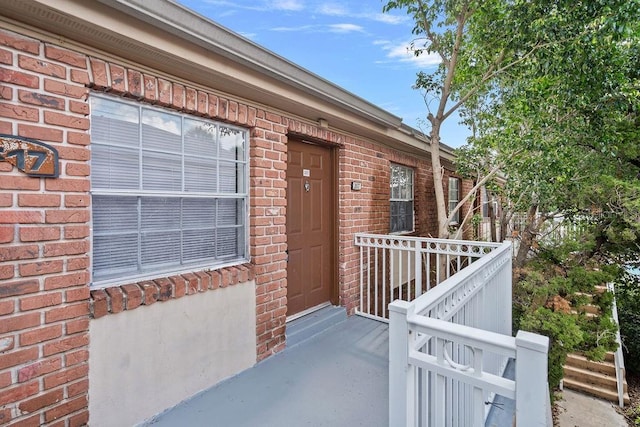 2517 Caper Ln Unit 207, Maitland, FL 32751 - property entrance featuring brick siding