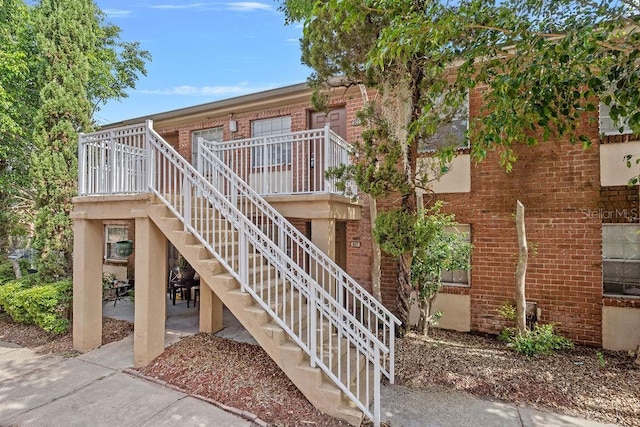 2517 Caper Ln Unit 207, Maitland, FL 32751 - view of building exterior featuring stairway