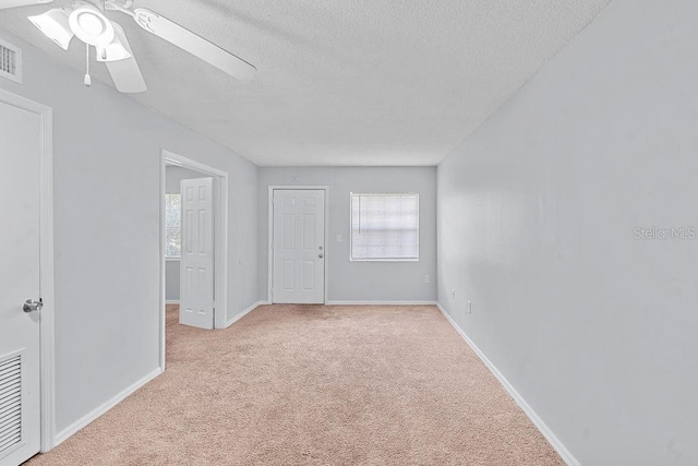 2517 Caper Ln Unit 207, Maitland, FL 32751 - carpeted empty room with ceiling fan and a textured ceiling