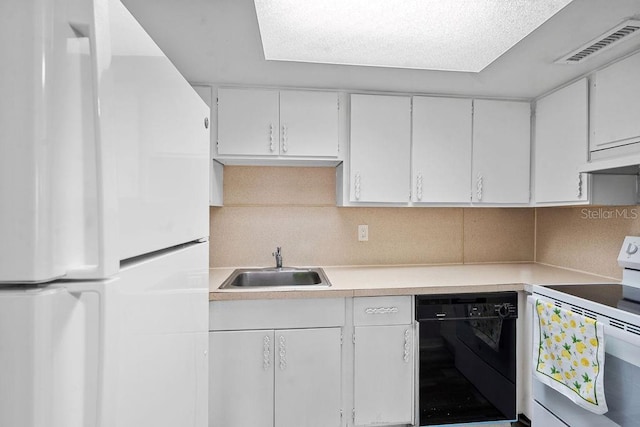 2517 Caper Ln Unit 207, Maitland, FL 32751 - kitchen with white appliances, light countertops, white cabinetry, and backsplash