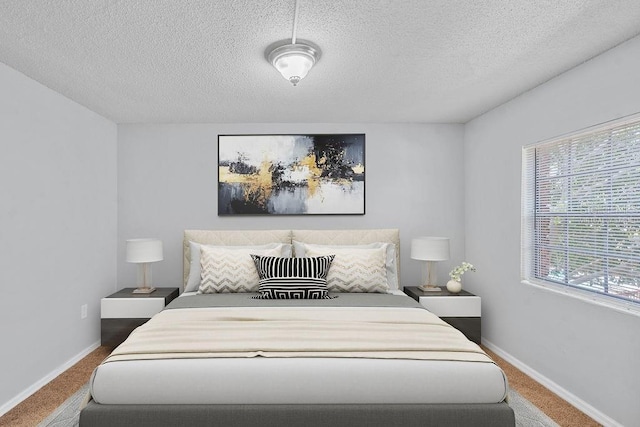 2517 Caper Ln Unit 207, Maitland, FL 32751 - carpeted bedroom with a textured ceiling