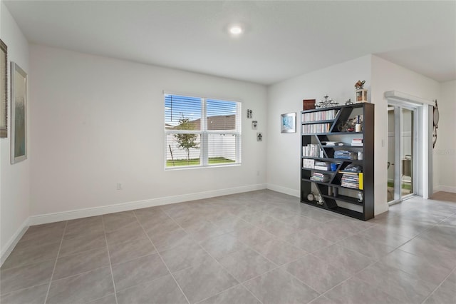 5808 Arboretum St, Saint Cloud, FL 34771 - empty room with light tile patterned floors and baseboards