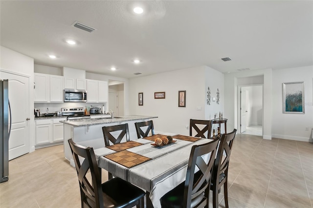 5808 Arboretum St, Saint Cloud, FL 34771 - dining space featuring recessed lighting and light tile patterned flooring