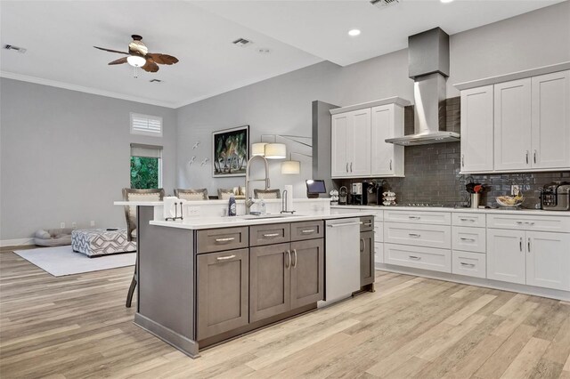 3316 Regal Crest Dr, Longwood, FL 32779 - kitchen featuring wall chimney range hood, dishwasher, light wood-type flooring, ceiling fan, and light countertops