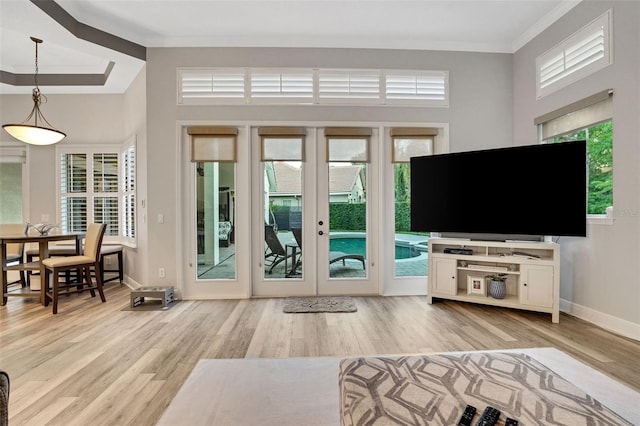 3316 Regal Crest Dr, Longwood, FL 32779 - foyer entrance with crown molding, wood finished floors, and french doors
