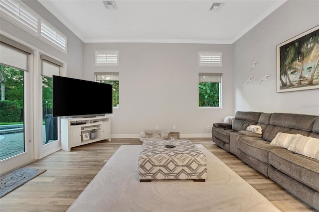 3316 Regal Crest Dr, Longwood, FL 32779 - living room featuring crown molding, wood finished floors, and a towering ceiling
